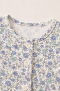 Baby wearing Anaario Lilac Bloom Garden organic mulmul cotton set, newborn to 24 months