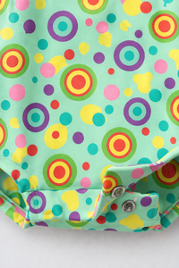 Baby wearing Anaario Multicolour Circle Print Bubble mint base romper, newborn to 24 months