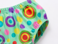 Baby wearing Anaario Mint Carnival mint base with multicolour circle print dress set, newborn to 24 months