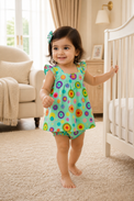 Baby wearing Anaario Mint Carnival mint base with multicolour circle print dress set, newborn to 24 months