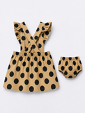 Baby wearing Anaario Mocha Dot Frill mocha base with black polka dots dress set, newborn to 24 months