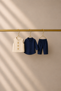 Baby wearing Anaario Navy Moon-Star Motif Jacket Kurta Set, navy kurta with ivory moon-and-star embroidered jacket, newborn to 24 months