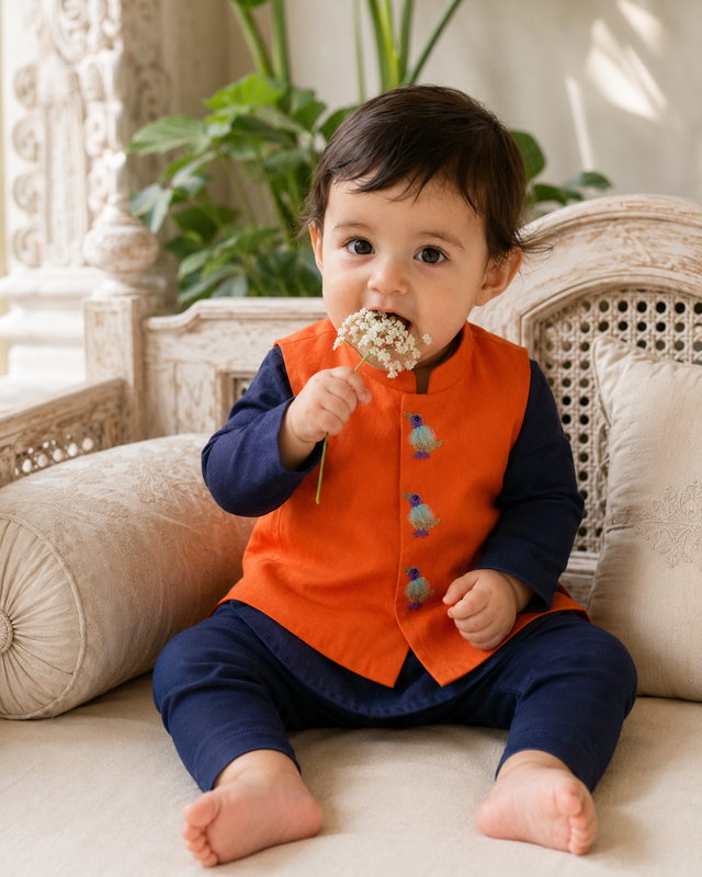 Baby wearing Anaario Navy Bird Motif Jacket Kurta Set, navy kurta with orange bird-embroidered jacket, newborn to 24 months