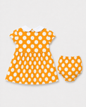 Baby wearing Anaario Orange Polka Bow orange with white polka dots dress set, newborn to 24 months