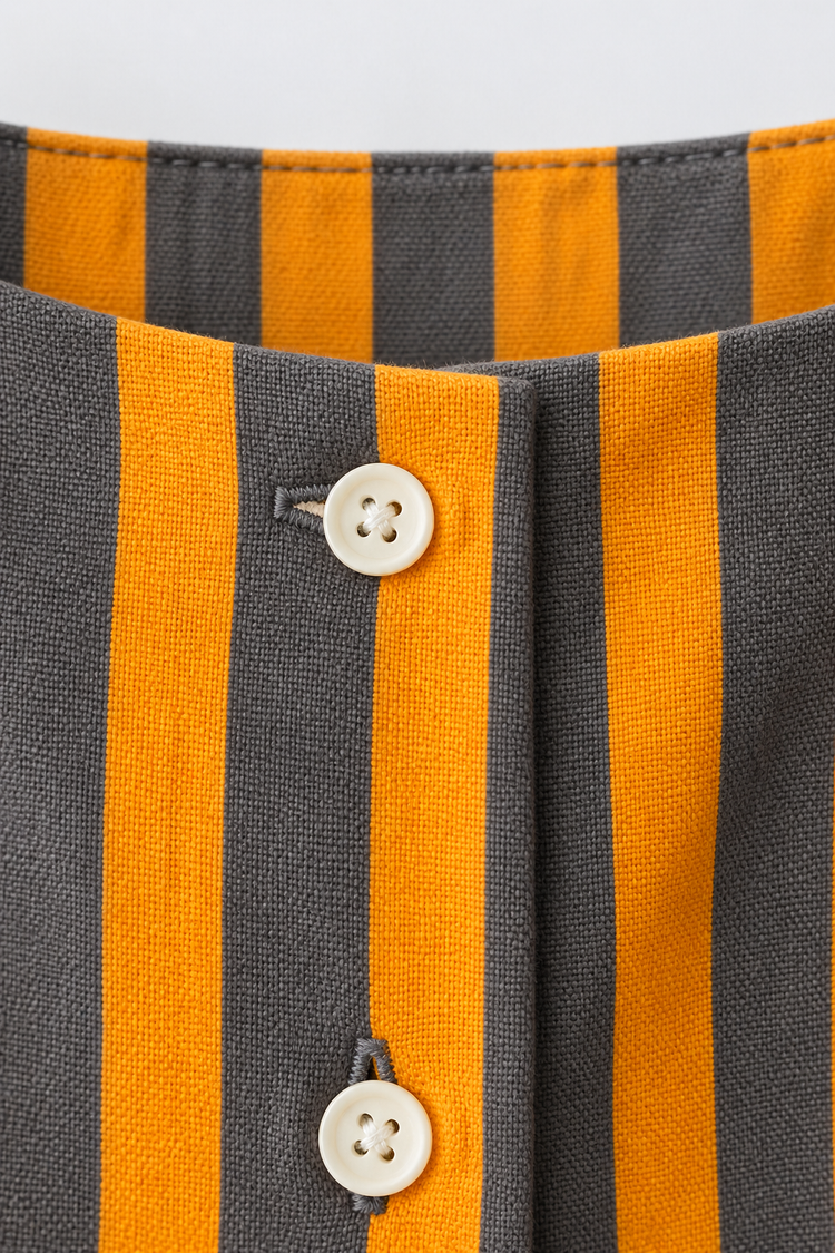 Baby wearing Anaario Orange Taupe Stripe Frill orange and taupe vertical stripes dress set, newborn to 24 months