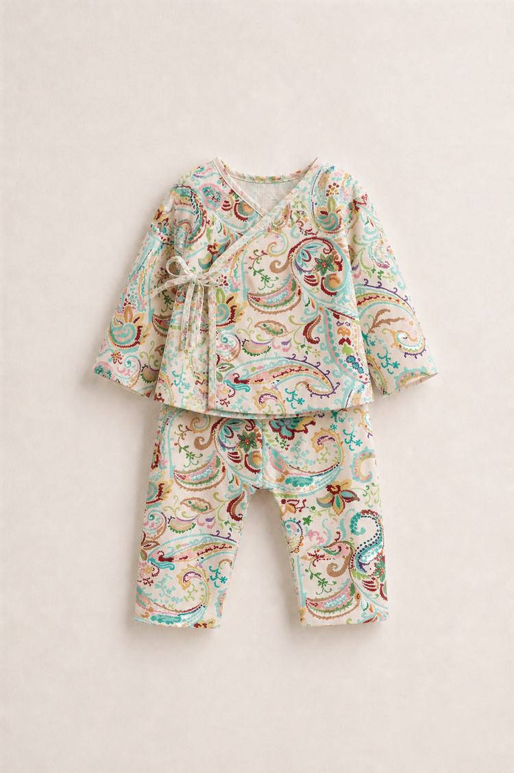 Baby wearing Anaario Pastel Paisley Wrap soft pastel paisley print co-ord set, newborn to 24 months
