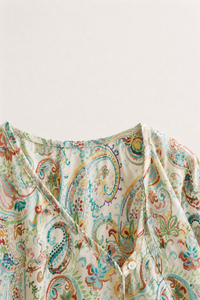 Baby wearing Anaario Pastel Paisley Wrap soft pastel paisley print co-ord set, newborn to 24 months