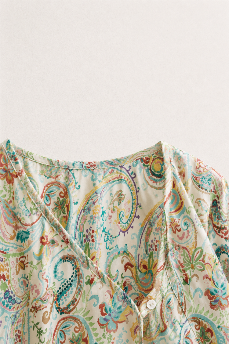 Baby wearing Anaario Pastel Paisley Wrap soft pastel paisley print co-ord set, newborn to 24 months