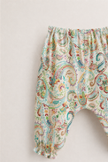 Baby wearing Anaario Pastel Paisley Wrap soft pastel paisley print co-ord set, newborn to 24 months