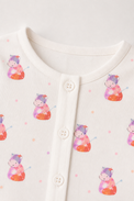 Baby wearing Anaario Pink Cow organic mulmul cotton set, newborn to 24 months