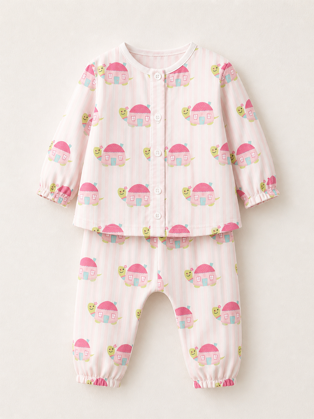 Baby wearing Anaario Pink Snail organic mulmul cotton set, newborn to 24 months