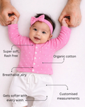 Baby wearing Anaario Pink and White Dots organic mulmul cotton Gleeful Giggles set, newborn to 24 months