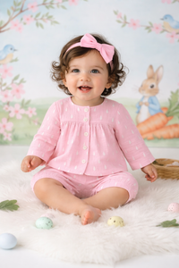 Baby wearing Anaario Pink and White Raindrops organic mulmul cotton Blossom Breeze set, newborn to 24 months