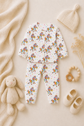 Baby wearing Anaario Rainbow Zebra organic mulmul cotton set, newborn to 24 months