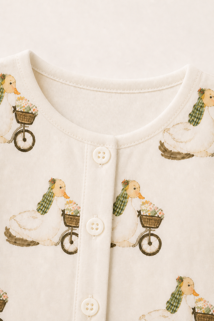Baby wearing Anaario Retro Scooters organic mulmul cotton set, newborn to 24 months