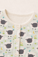 Baby wearing Anaario Sheep and Nightsky organic cotton pyjama set, newborn to 24 months