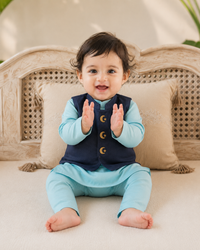 Baby wearing Anaario Sky Blue Moon-Star Motif Jacket Kurta Set, sky blue kurta with navy moon-and-star embroidered jacket, newborn to 24 months