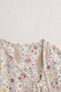 Baby wearing Anaario Vintage Floral Paisley Wrap co-ord set, newborn to 24 months
