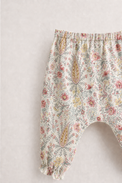 Baby wearing Anaario Vintage Floral Paisley Wrap co-ord set, newborn to 24 months