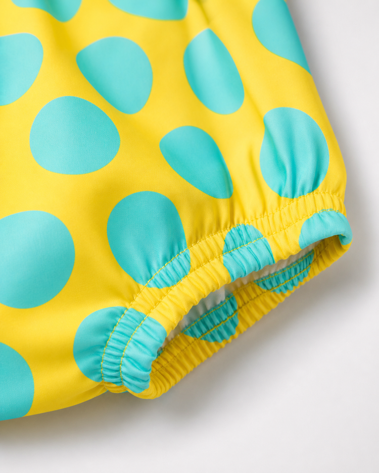 Baby wearing Anaario Yellow Aqua Polka Dot Frill sleeveless romper, newborn to 24 months