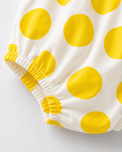Baby wearing Anaario Yellow Dot Frill white with yellow polka dots dress set, newborn to 24 months