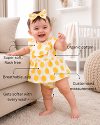 Baby wearing Anaario Yellow Dot Frill white with yellow polka dots dress set, newborn to 24 months