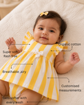 Baby wearing Anaario Yellow Stripe Frill yellow and white stripes dress set, newborn to 24 months