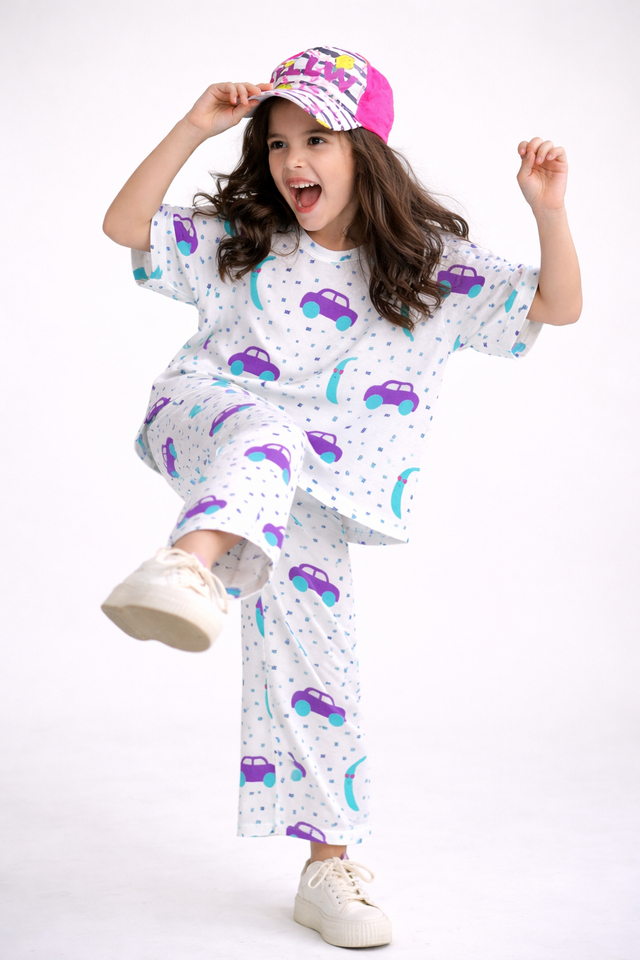 Girl wearing Anaario Banana and Race Cars Co-ord Set