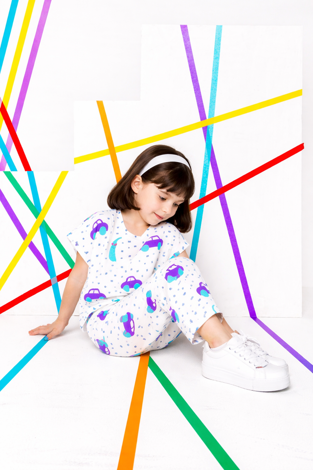 Girl wearing Anaario Banana and Race Cars Co-ord Set