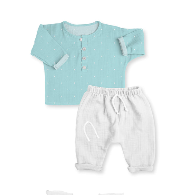 Baby wearing Anaario Blue and White Dots organic mulmul cotton nightwear set, newborn to 24 months