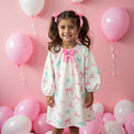 Girl wearing Anaario Bow Bliss Balloon Dress