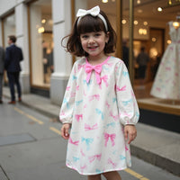Girl wearing Anaario Bow Bliss Balloon Dress