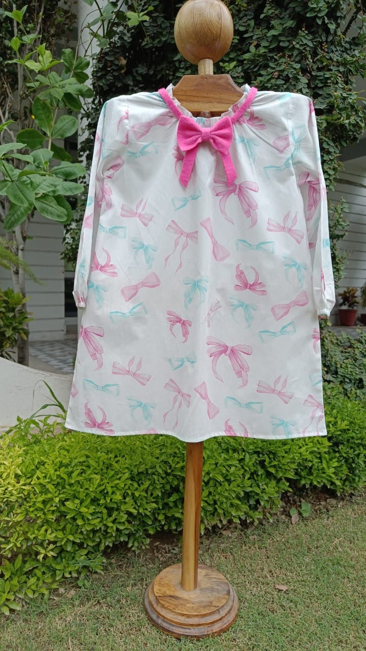 Girl wearing Anaario Bow Bliss Balloon Dress