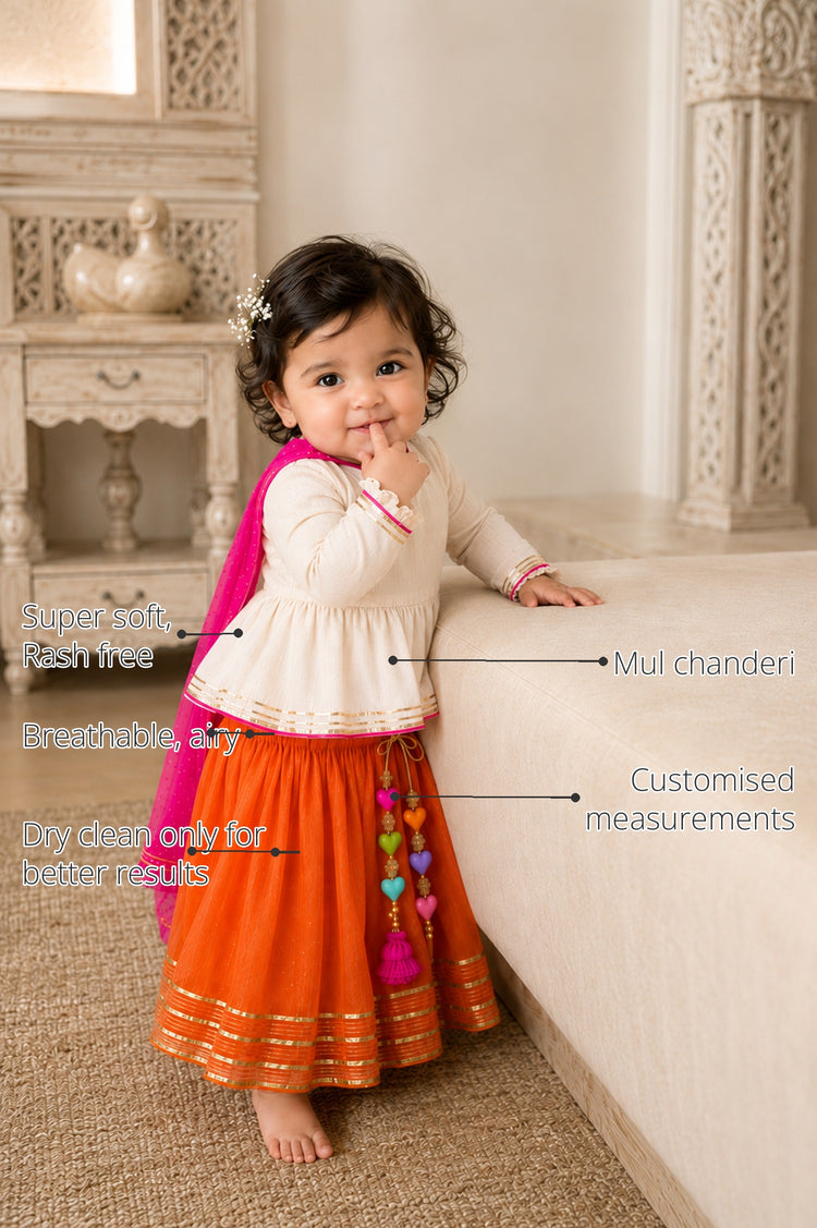 Ivory Peplum Baby Lehenga Set features