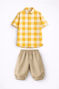 Boy wearing Anaario Butter Check Balloon Co-ord Set, yellow check shirt with matching balloon-style pant