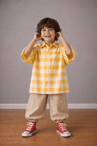 Boy wearing Anaario Butter Check Balloon Co-ord Set, yellow check shirt with matching balloon-style pant