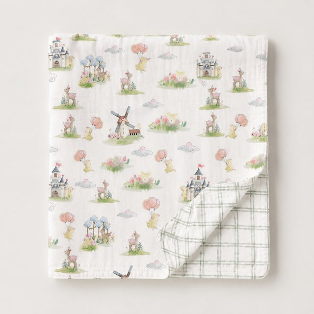 Carnival Windmill bamboo baby quilt — draped