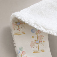 Carousel bamboo baby bib — carousel print, soft bamboo cotton