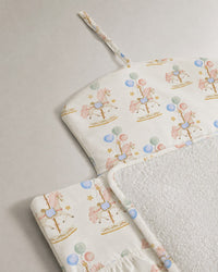 Carousel bamboo baby changing mat — carousel print, soft bamboo cotton
