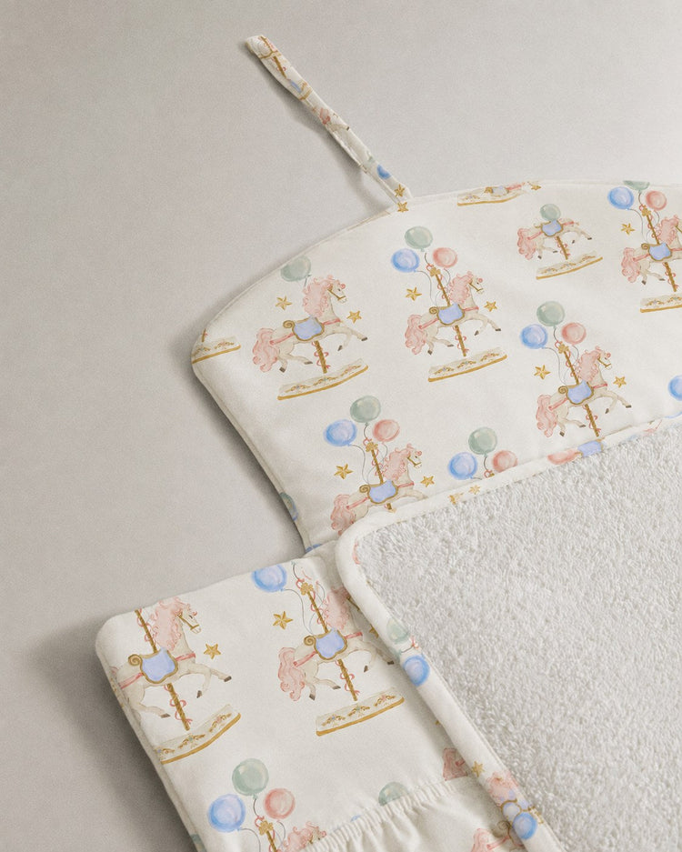 Carousel bamboo baby changing mat — carousel print, soft bamboo cotton