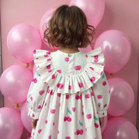 Girl wearing Anaario Cherry Heart Ruffle Dress