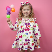 Girl wearing Anaario Cherry Jubilee Ruffle Dress