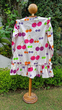 Girl wearing Anaario Cherry Jubilee Ruffle Dress