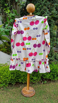 Girl wearing Anaario Cherry Jubilee Ruffle Dress