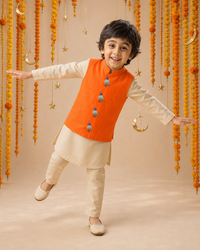 Cream Bird-Motif Waistcoat Set (Orange Waistcoat) - festive lifestyle photo, marigold and crescent backdrop