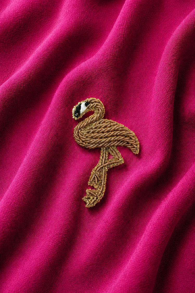 Flamingo embroidered motif, close-up detail