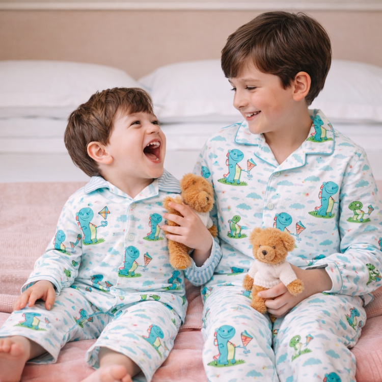 Boy wearing Anaario Dino-Kites Night Suit