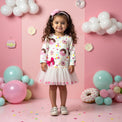 Girl wearing Anaario Dotty Donut Dress
