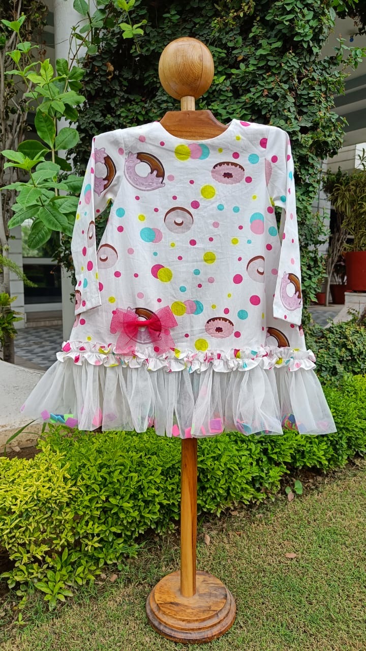 Girl wearing Anaario Dotty Donut Dress