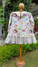 Girl wearing Anaario Dotty Donut Dress